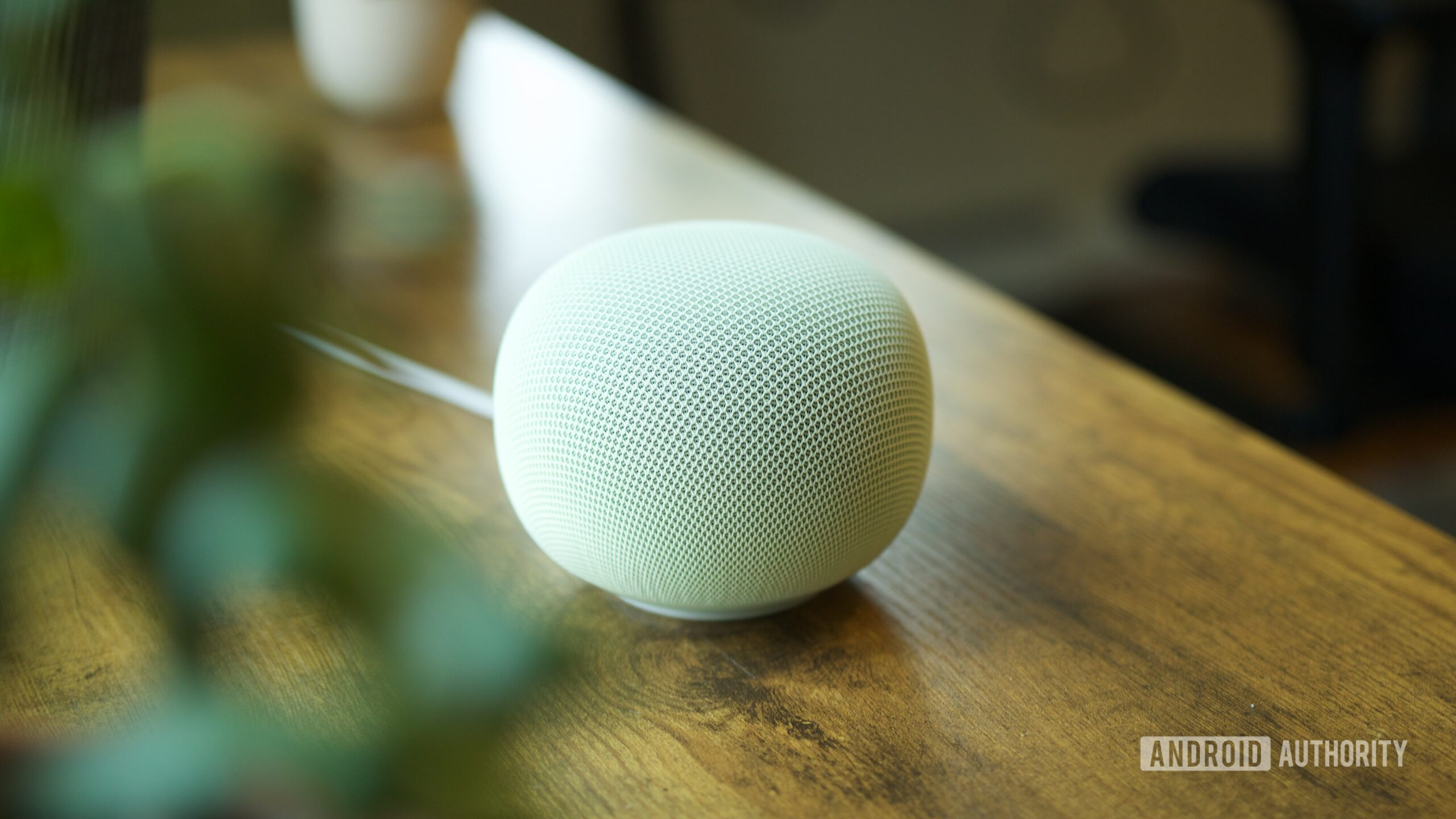 google home speaker review 6 Google Home Speaker sitting on a desk.