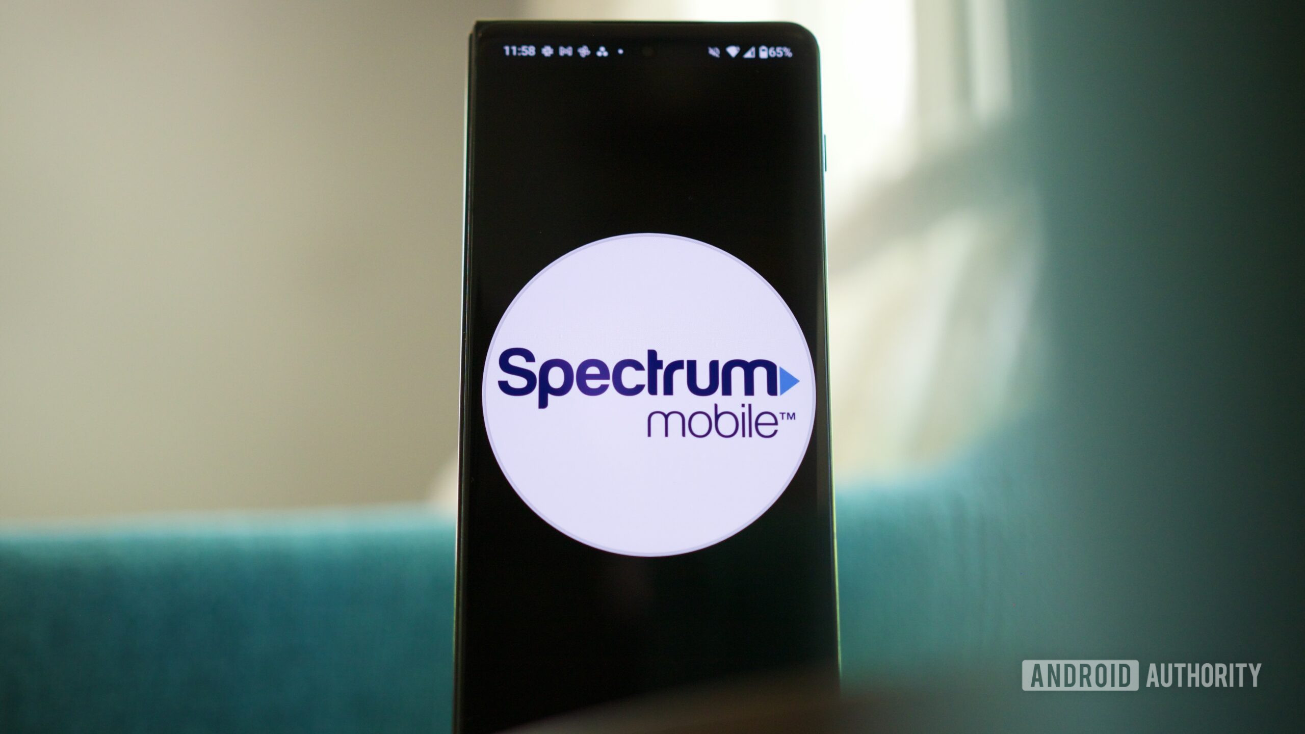 Spectrum Mobile logo displayed on an Android phone.