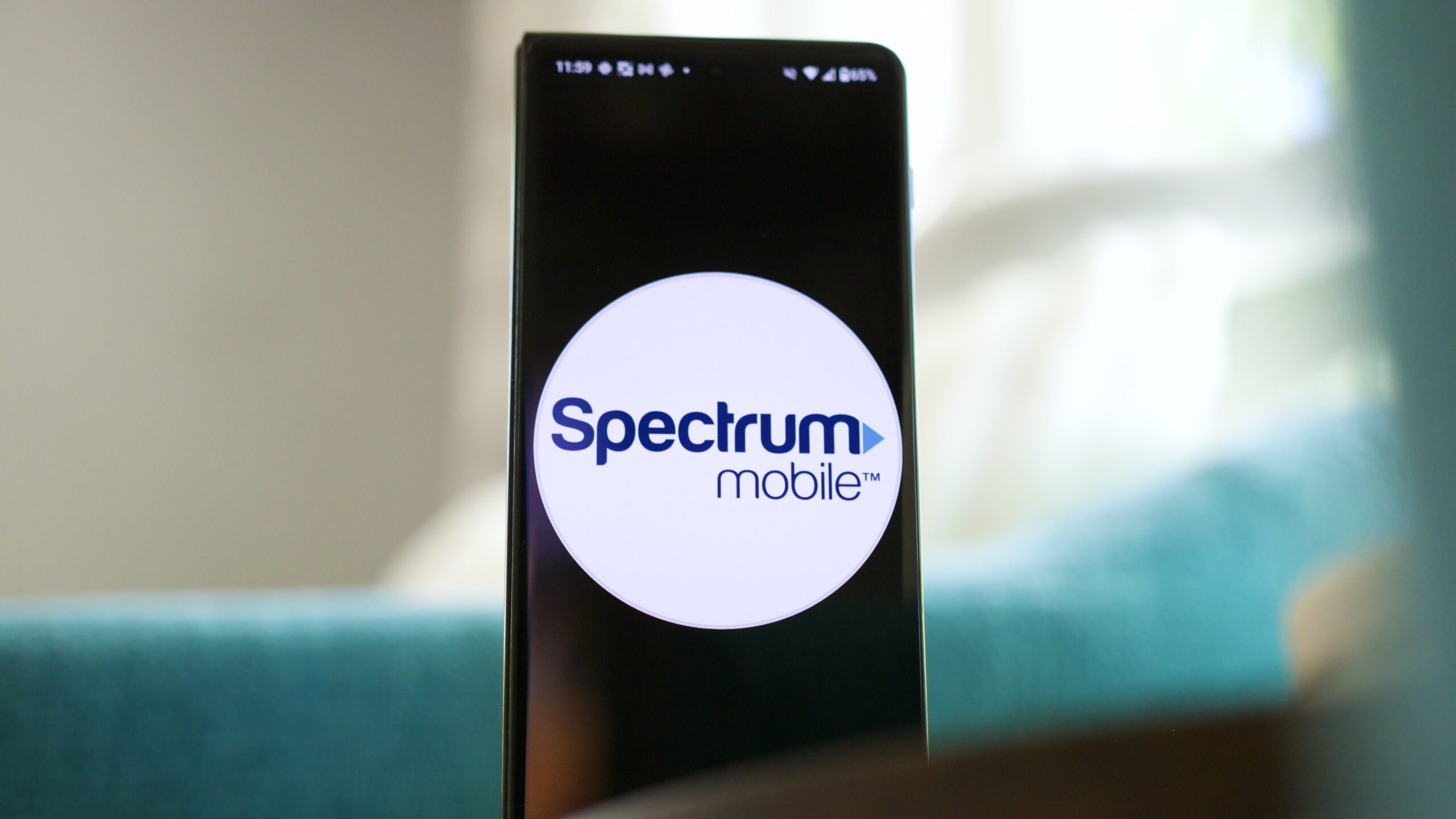 Spectrum Mobile logo displayed on an Android phone.