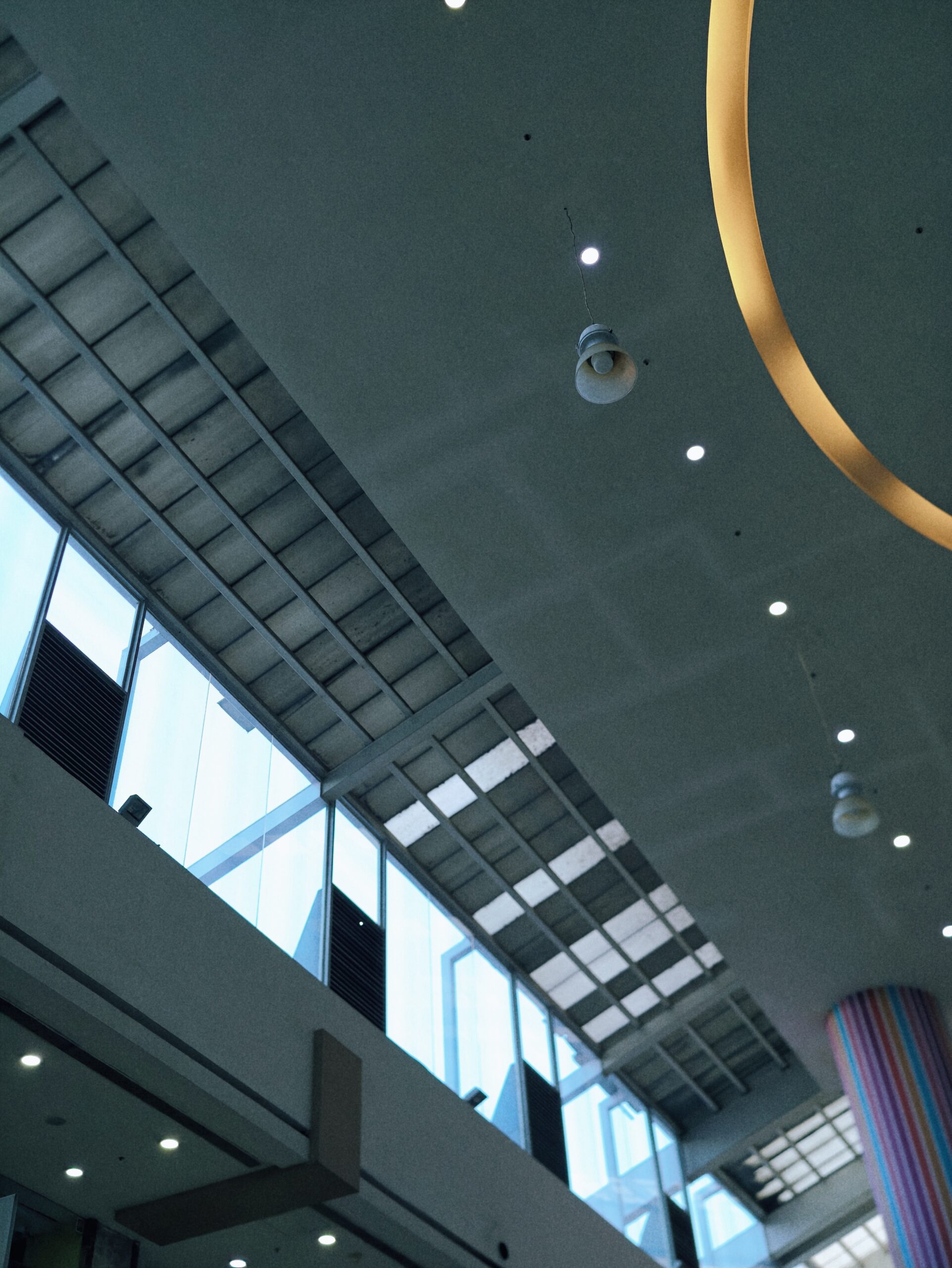 the interior of a mall shot on the vivo x300 ultra with textured film stock style