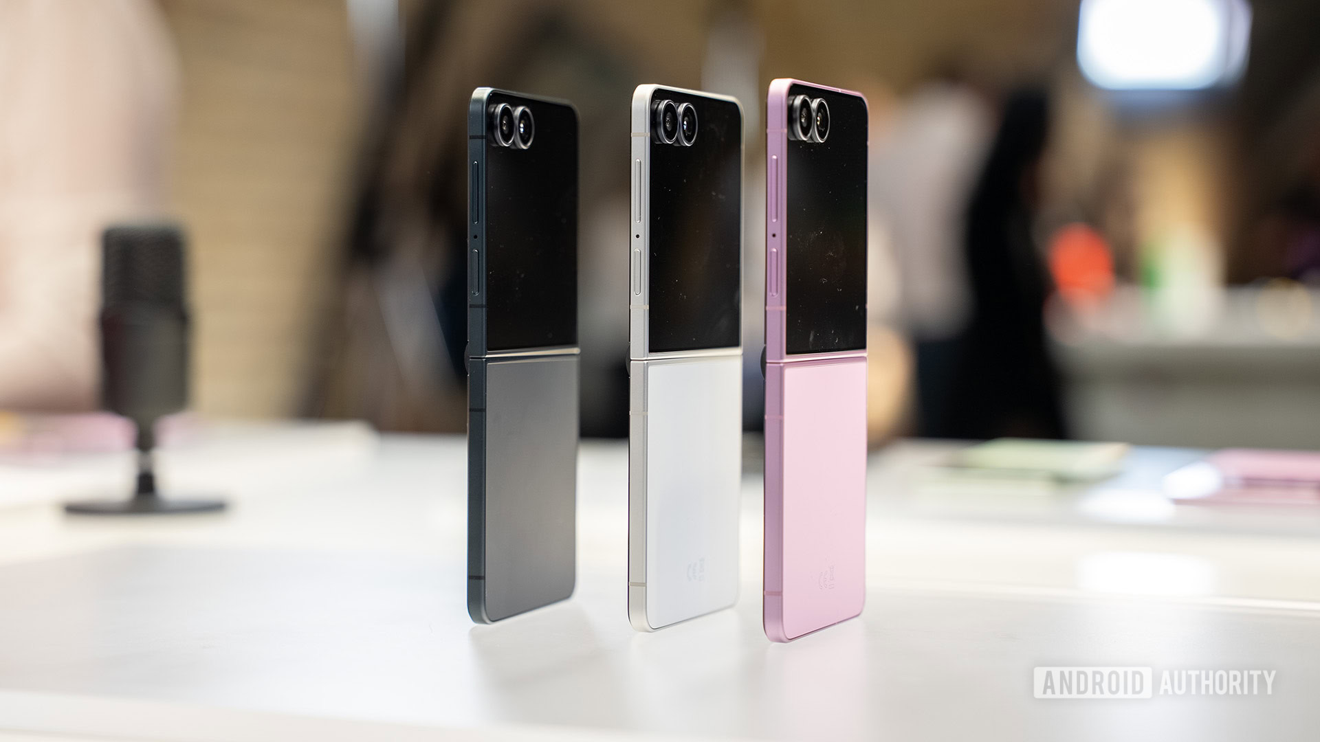 Galaxy Z Flip 8 stood up on angle showing slimness Galaxy Z Flip 8 stood up on angle showing slimness