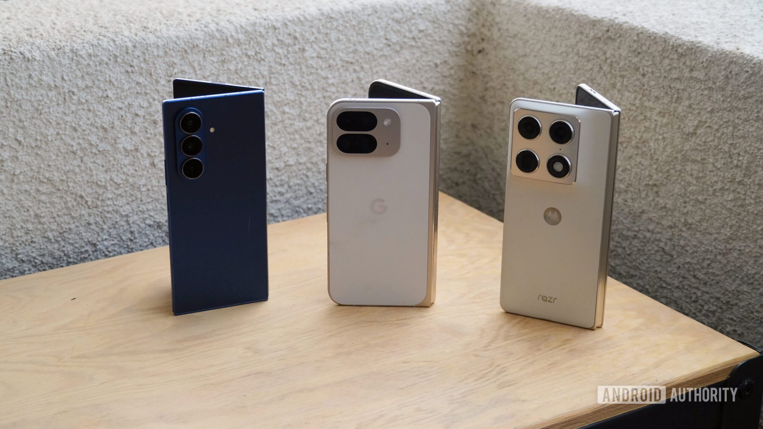 A Pixel 9 Pro Fold in between a Razr Fold and Galaxy Z Fold 7.