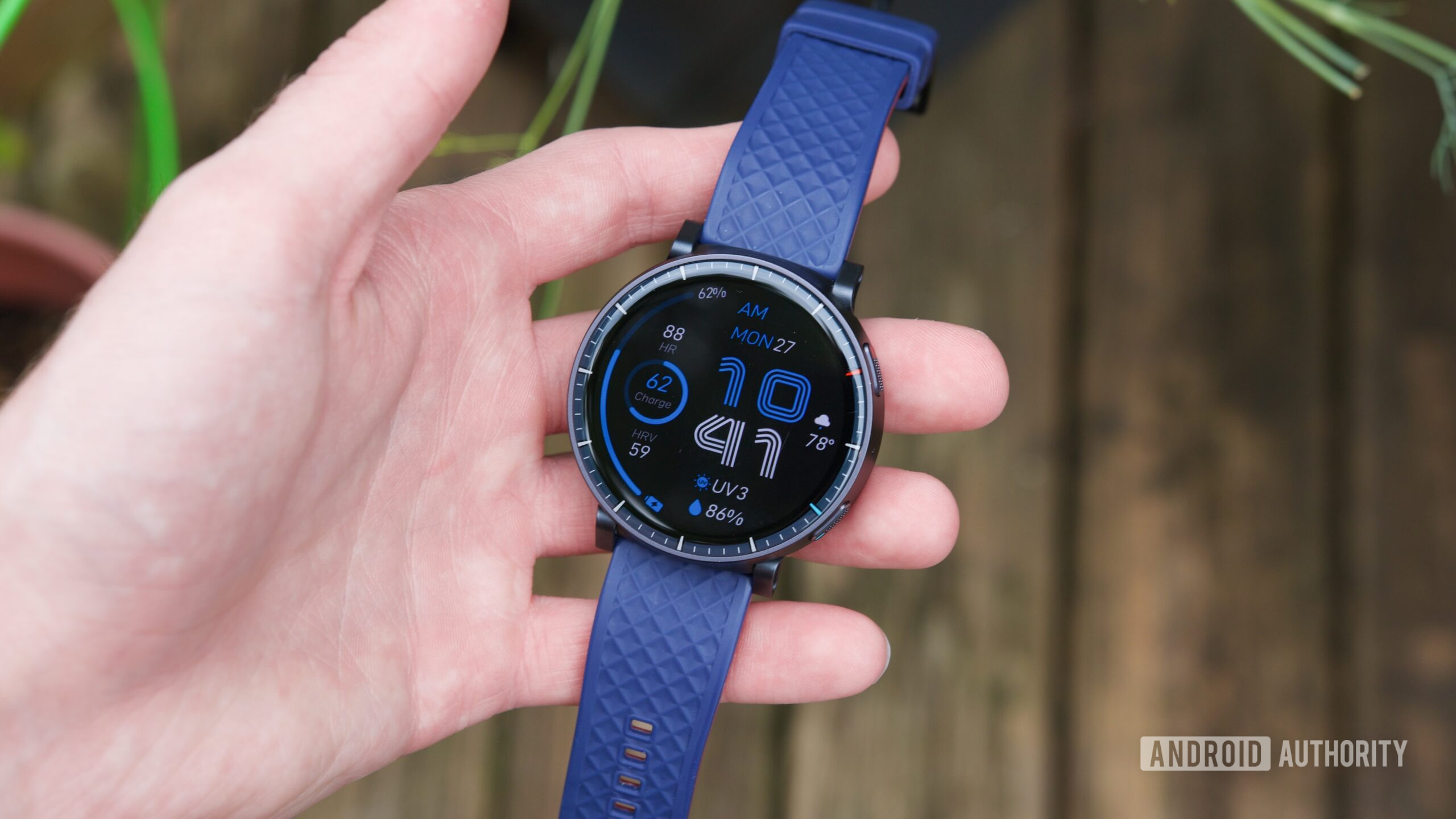 Someone holding the Amazfit Active Max.