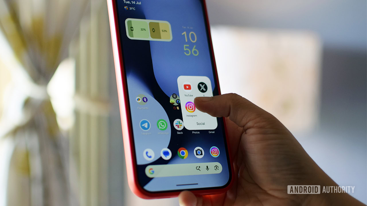 android 17 pause point alternatives cover Photo of someone opening an app folder on an Android phone.