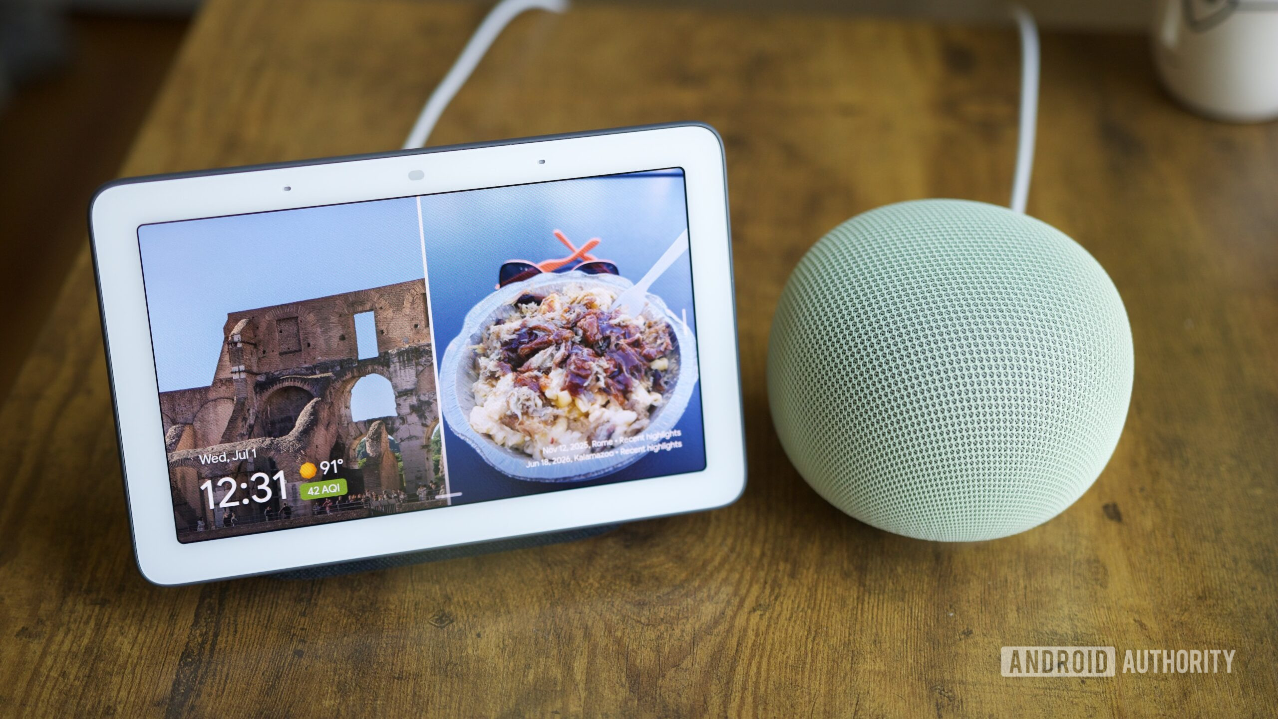 Google Nest Hub and Google Home Speaker sitting next to each other.