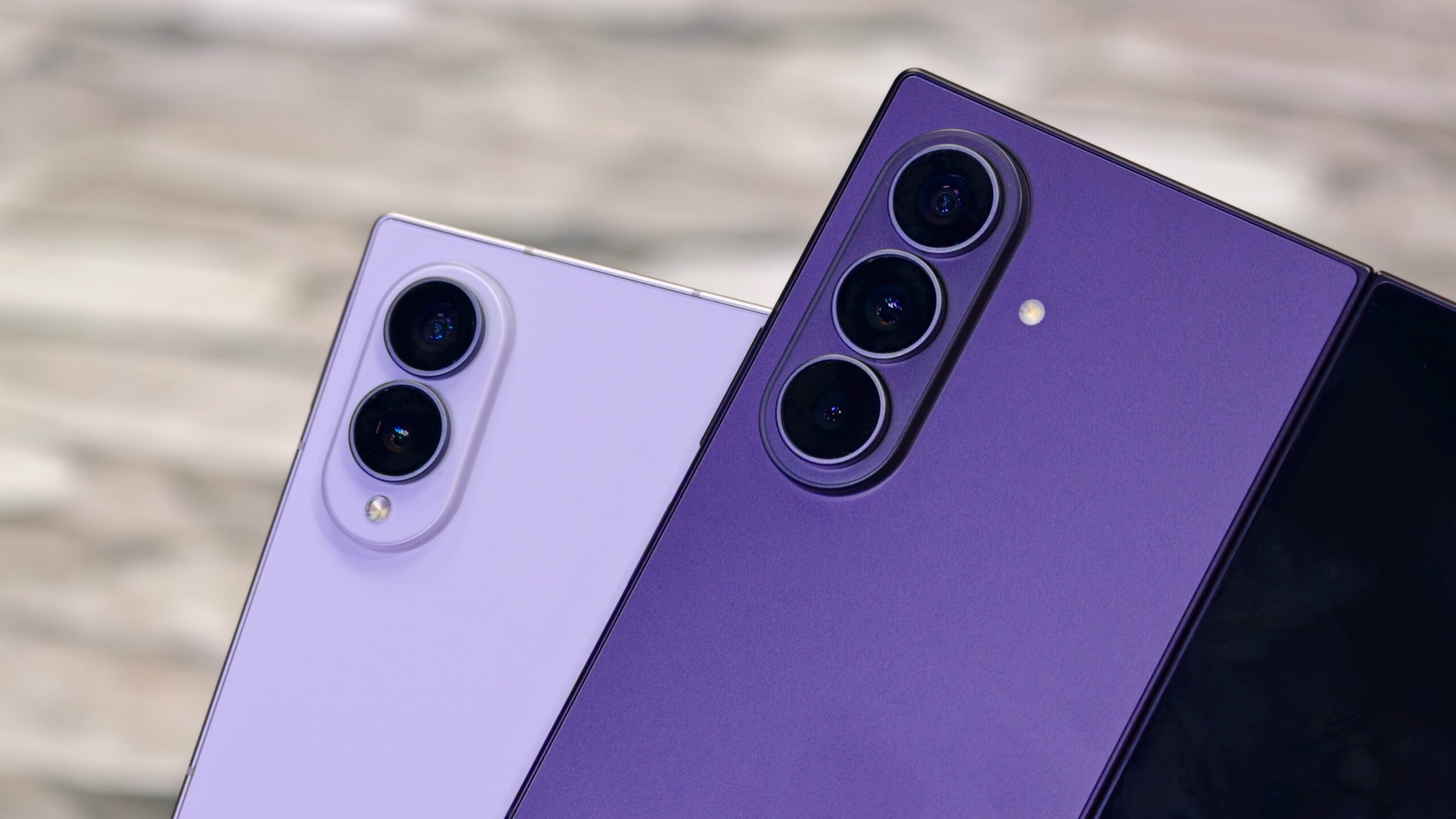z fold 8 launch day 7 Close-up comparing the camera modules and back finishes of the Galaxy Z Fold 8 Ultra and the Galaxy Z Fold 8 side-by-side