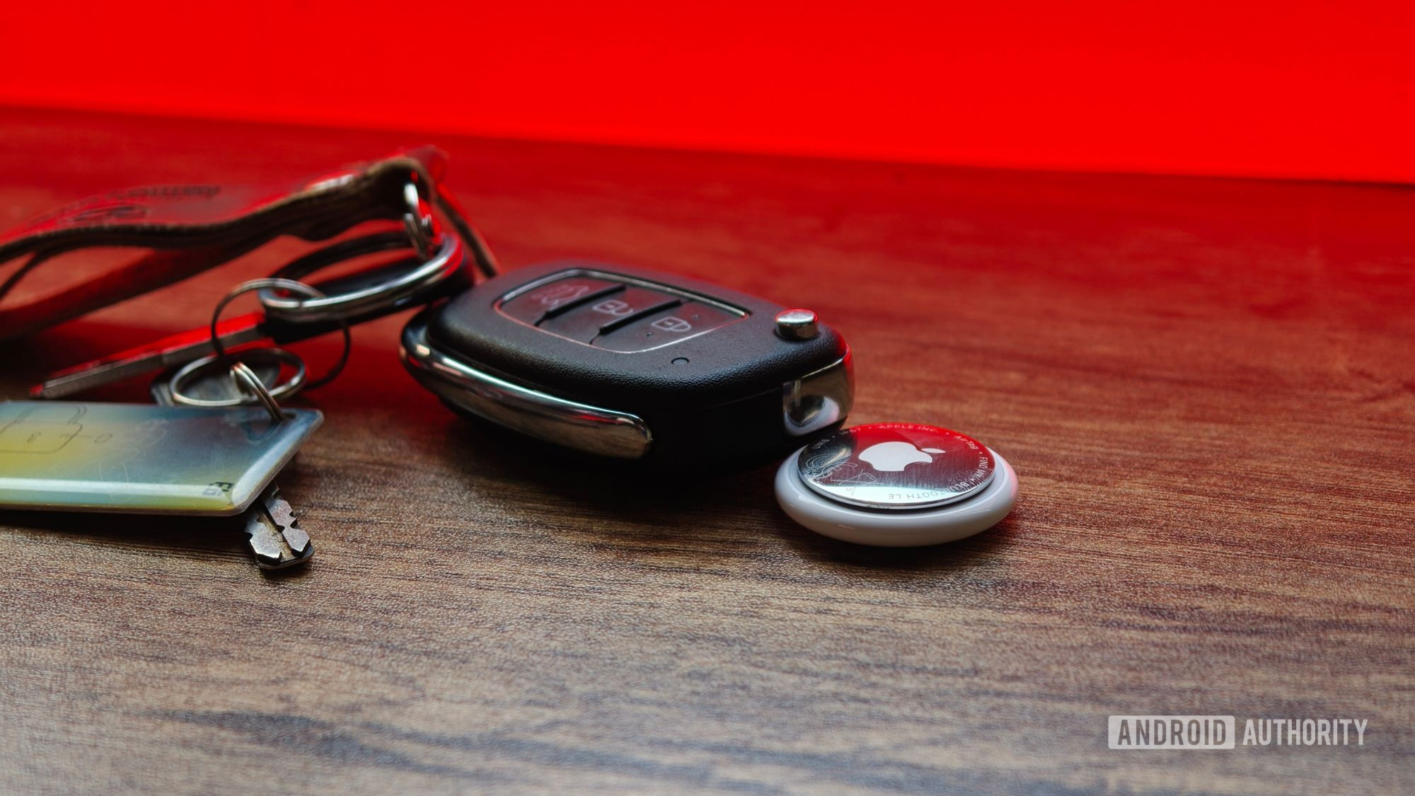 Apple AirTag 2 beside car keys Apple AirTag 2 beside car keys