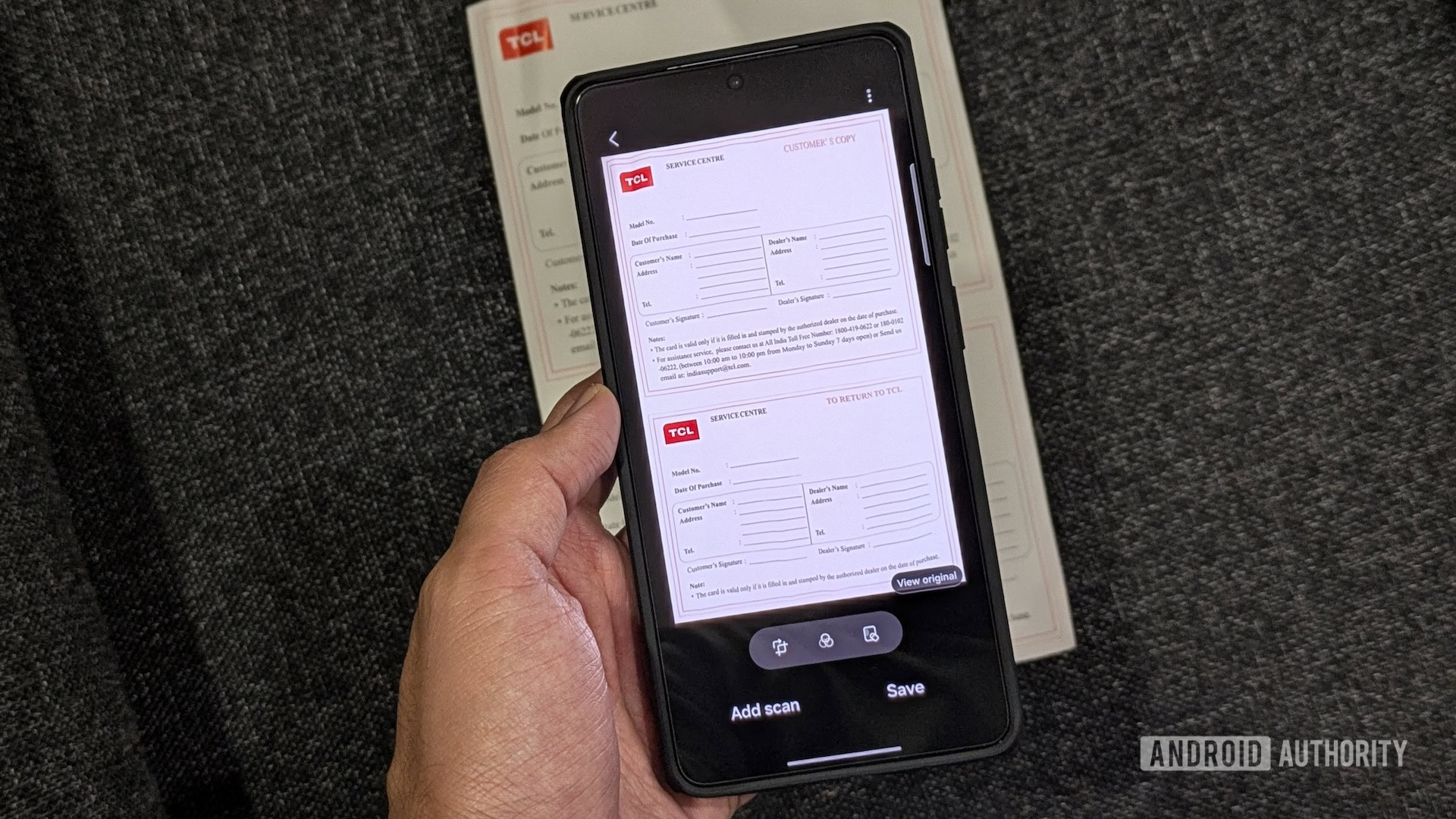 Scanning a document using Samsung's built-in document scanner in the Camera app.