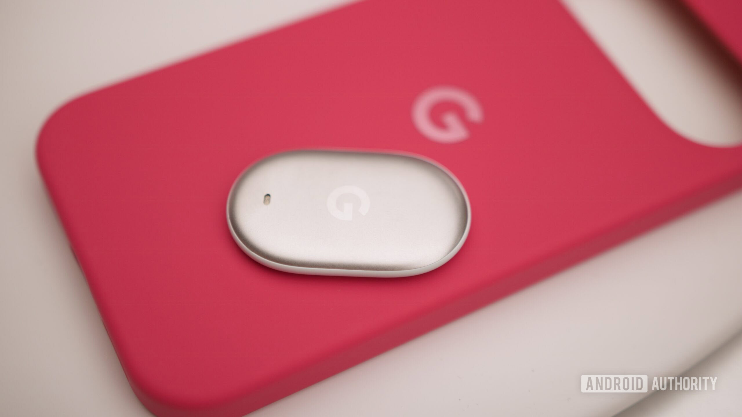 google pixel tag hands on 4 Google Pixel Tag on top of a Pixel 11 case.