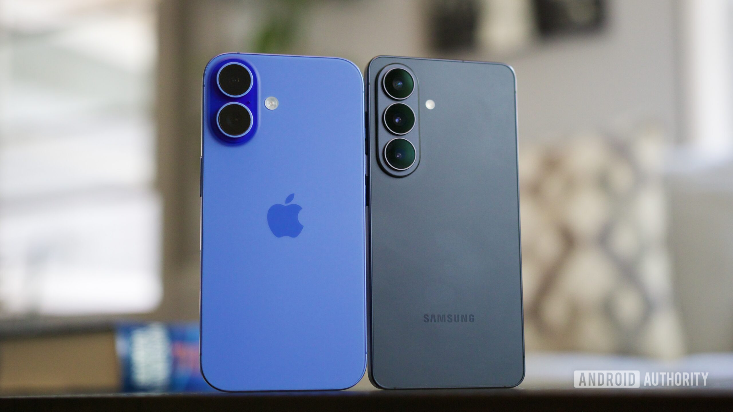 iphone samsung galaxy side by side 1 An iPhone 16 and Samsung Galaxy S26 next to each other.