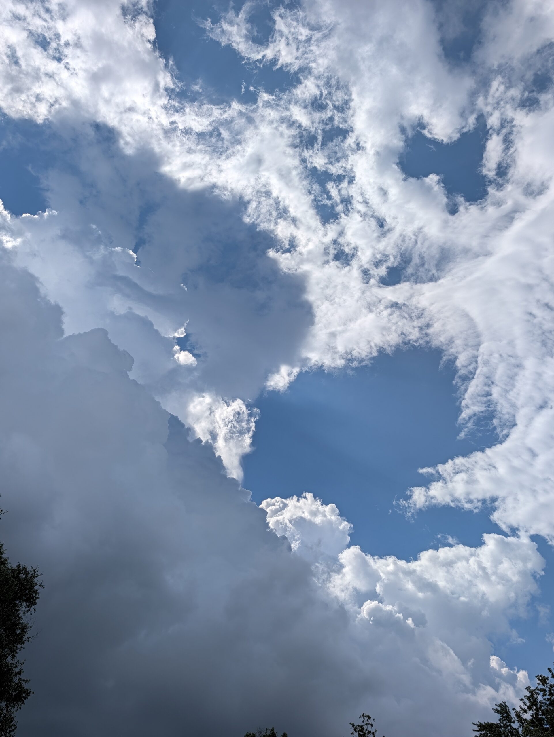 Photo of a blue sky with lots of clouds, taken with the Pixel 11 Pro.