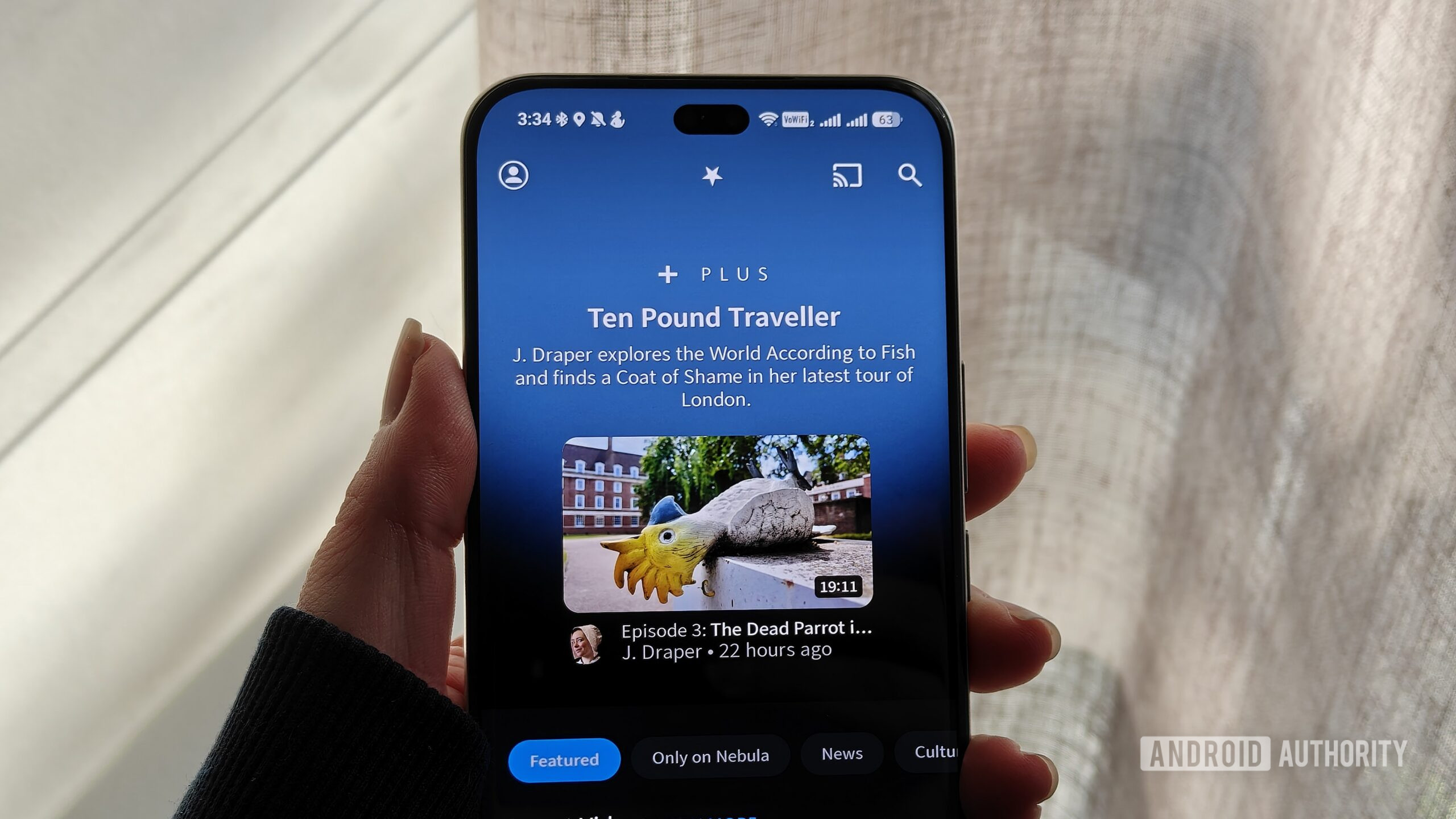 the nebula app on a smartphone held in a hand