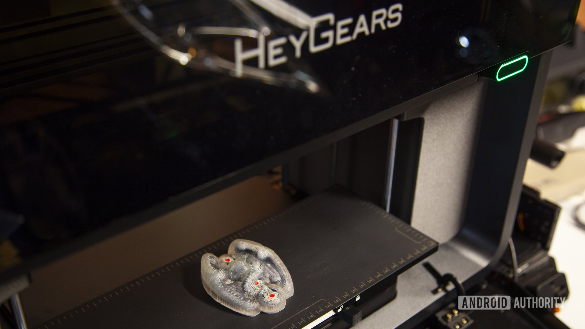 HeyGears G1X full-color 3D printer with a completed full-color print with support material