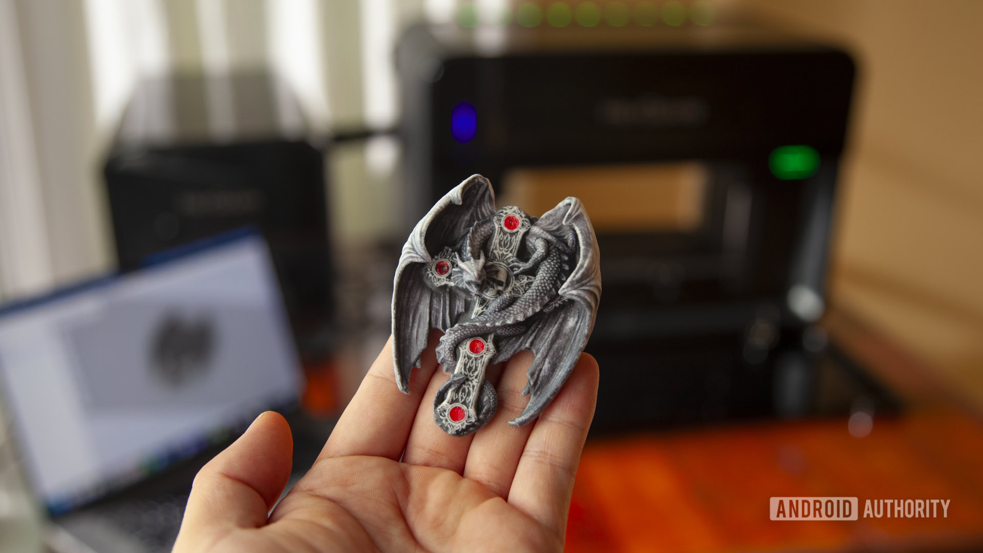 HeyGears G1X full-color 3D printer with completed full-color 3D print of a dragon cross model