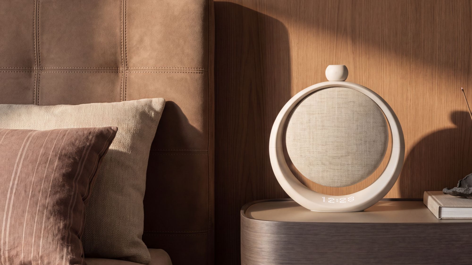 Anker Soundcore SleepLab Pro on a bedside table in the morning Anker Soundcore SleepLab Pro on a bedside table in the morning