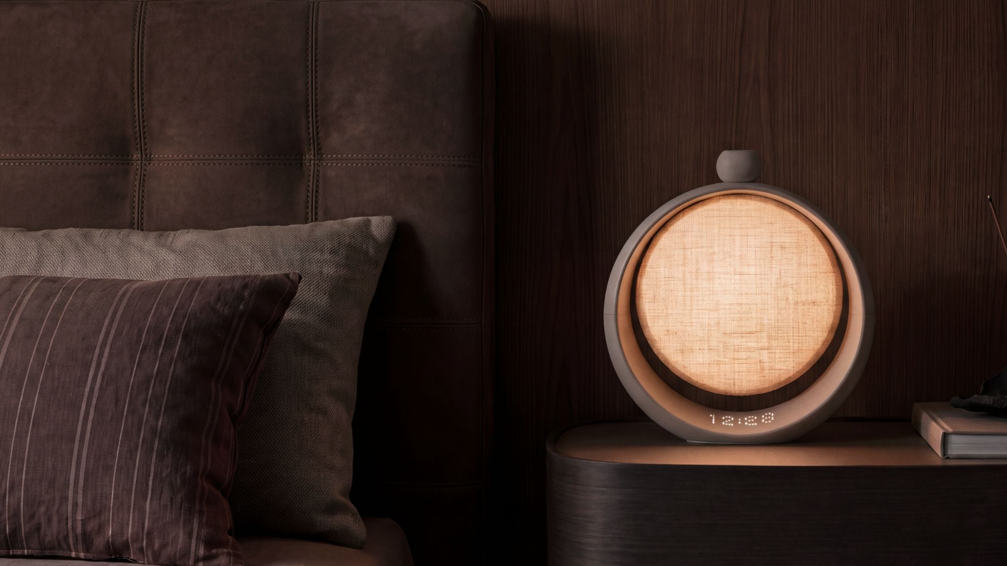 Anker Soundcore SleepLab Pro on a bedside table Anker Soundcore SleepLab Pro on a bedside table