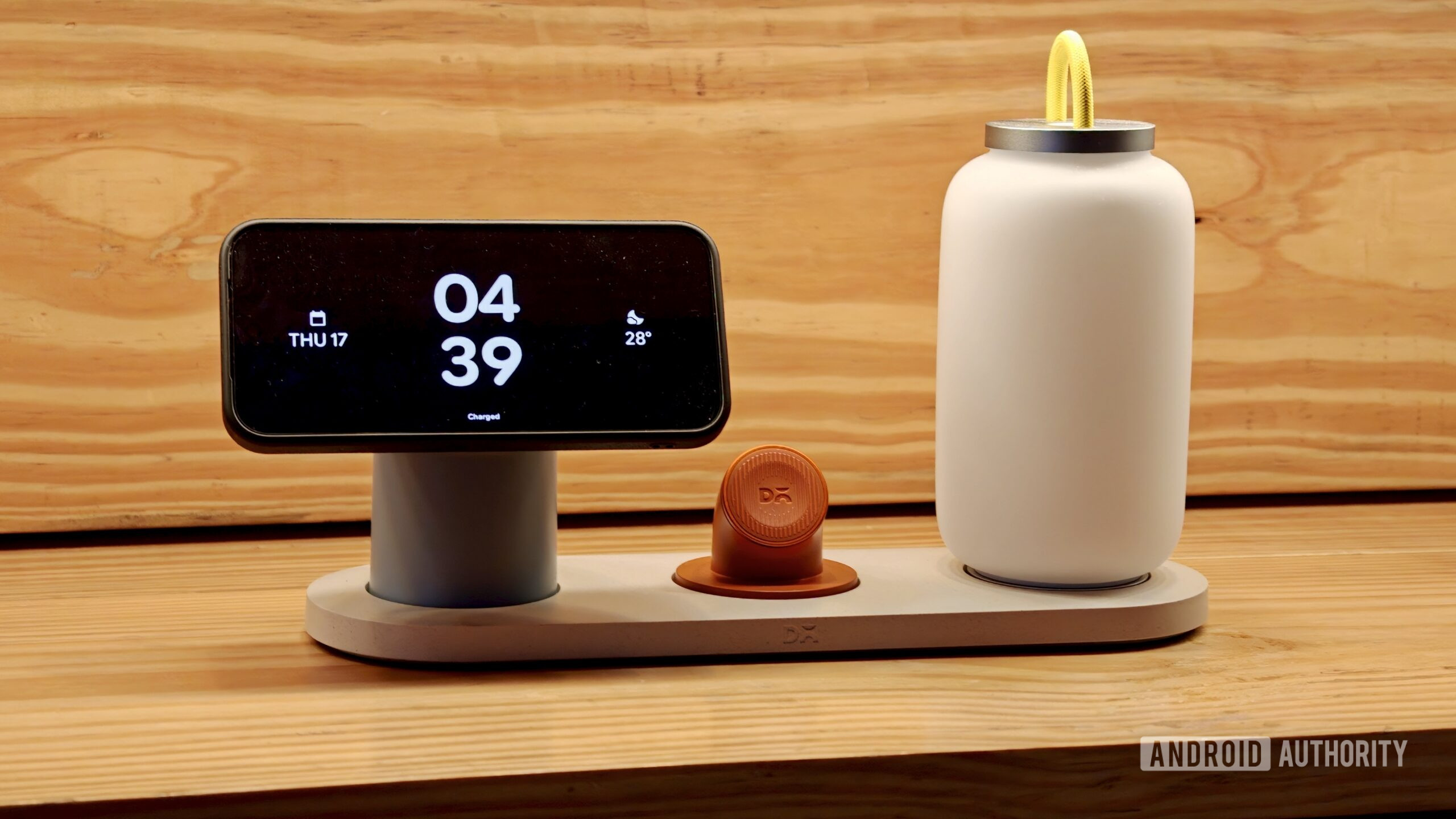 Daily Objects Node with phone on charge, Apple Watch charger Daily Objects Node with phone on charge, Apple Watch charger