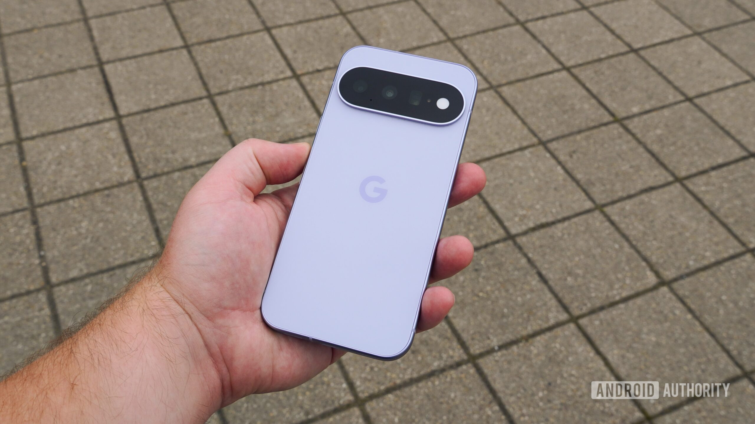 The Google Pixel 11 in the hand.