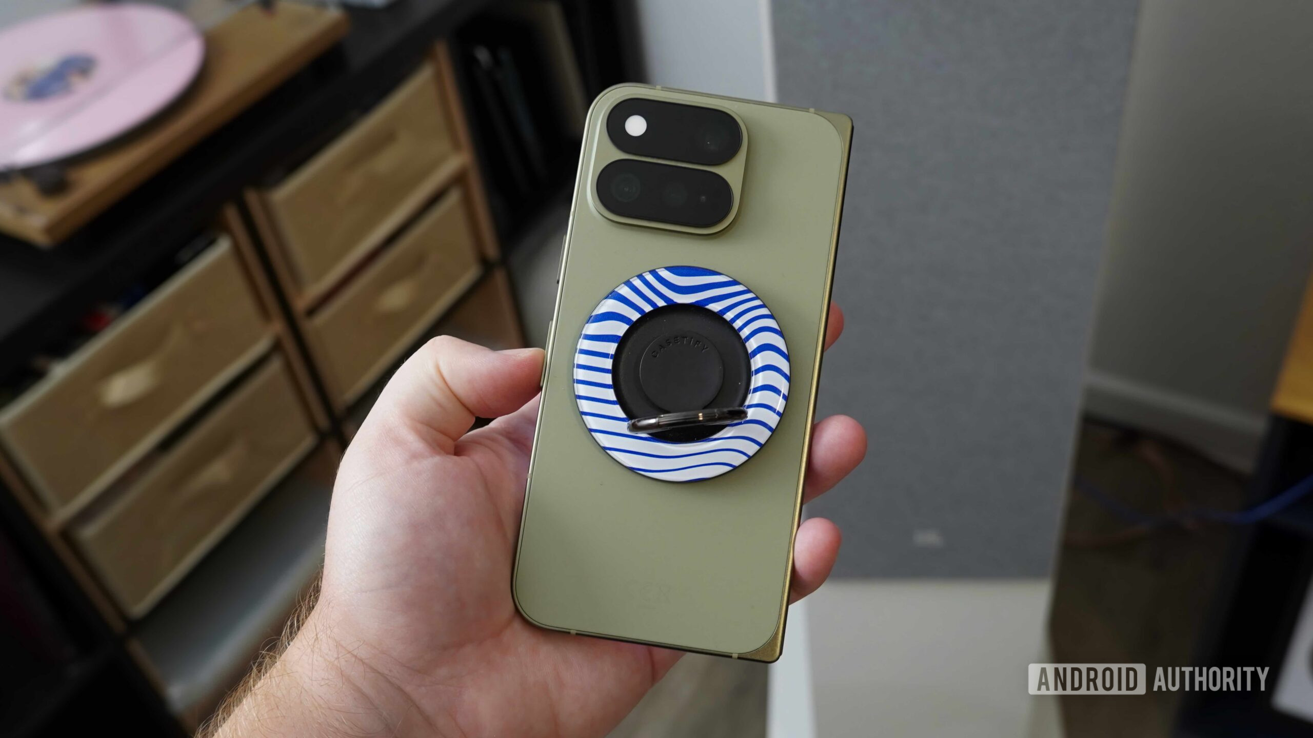 Google Pixel 11 Pro Fold Qi2 A Qi2 ring stand on the Pixel 11 Pro Fold.