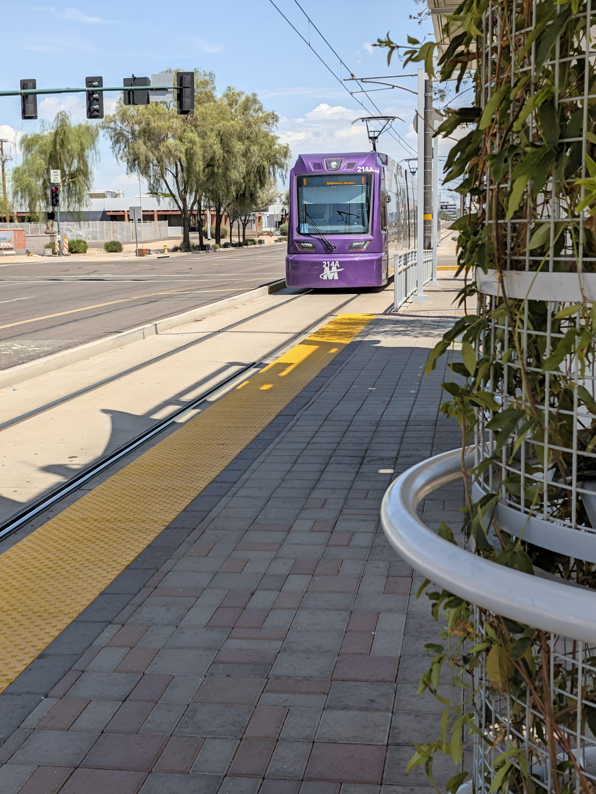 A light rail train arriving as captured by the Google Pixel 11 camera.
