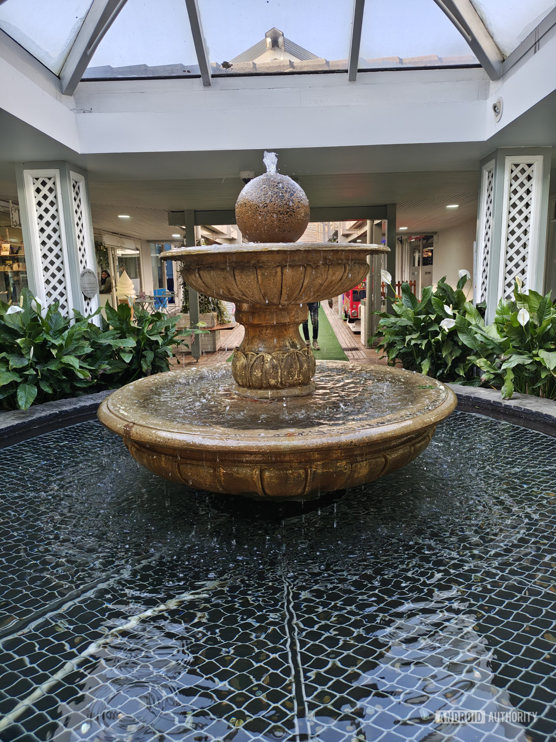 a fountain at a shopping center