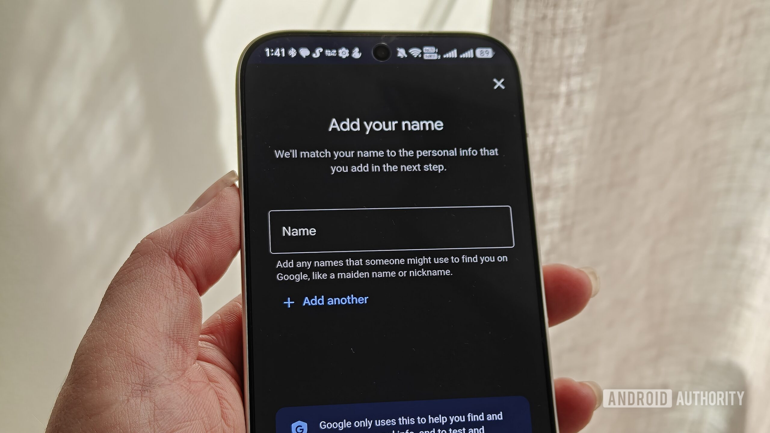 a smartphone showing the add your name field in results about you