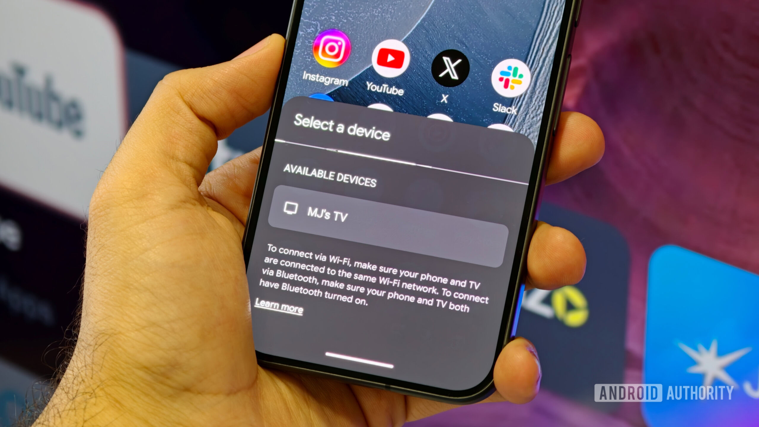 android quick settings tiles 3 A hand holding a smartphone showing the "Select a device" pop-up drawer to connect the virtual TV Remote to an available smart TV