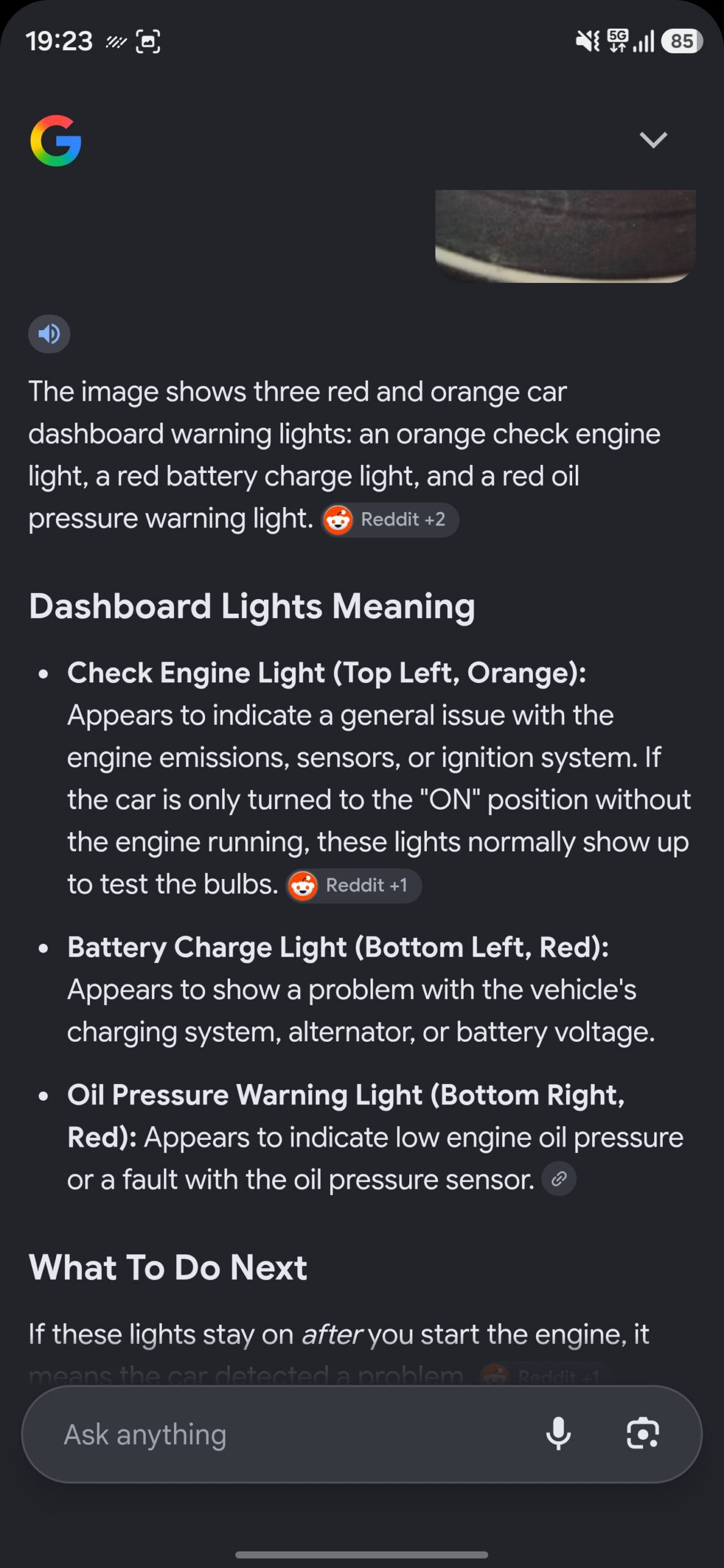 Google Lens' response to a car's dashboard symbols.