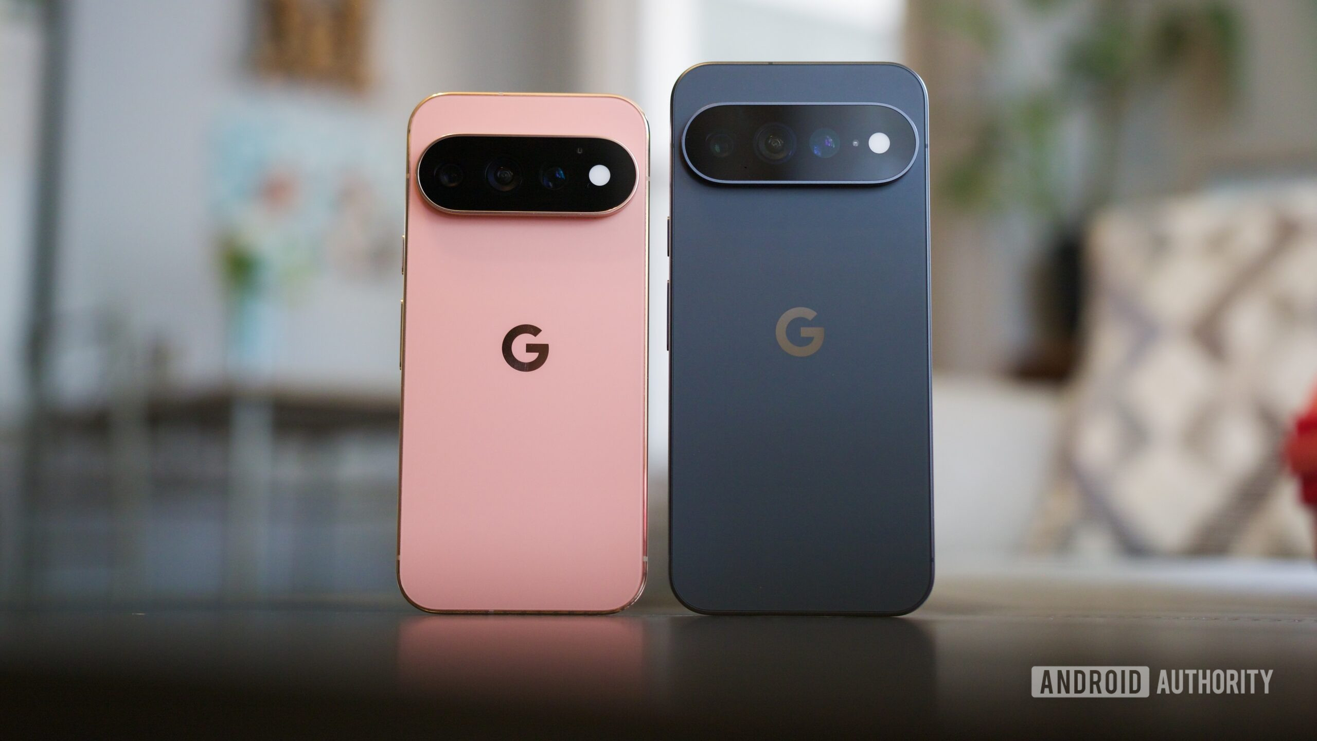 Pixel 11 Pro and Pixel 11 Pro XL standing upright next to each other.