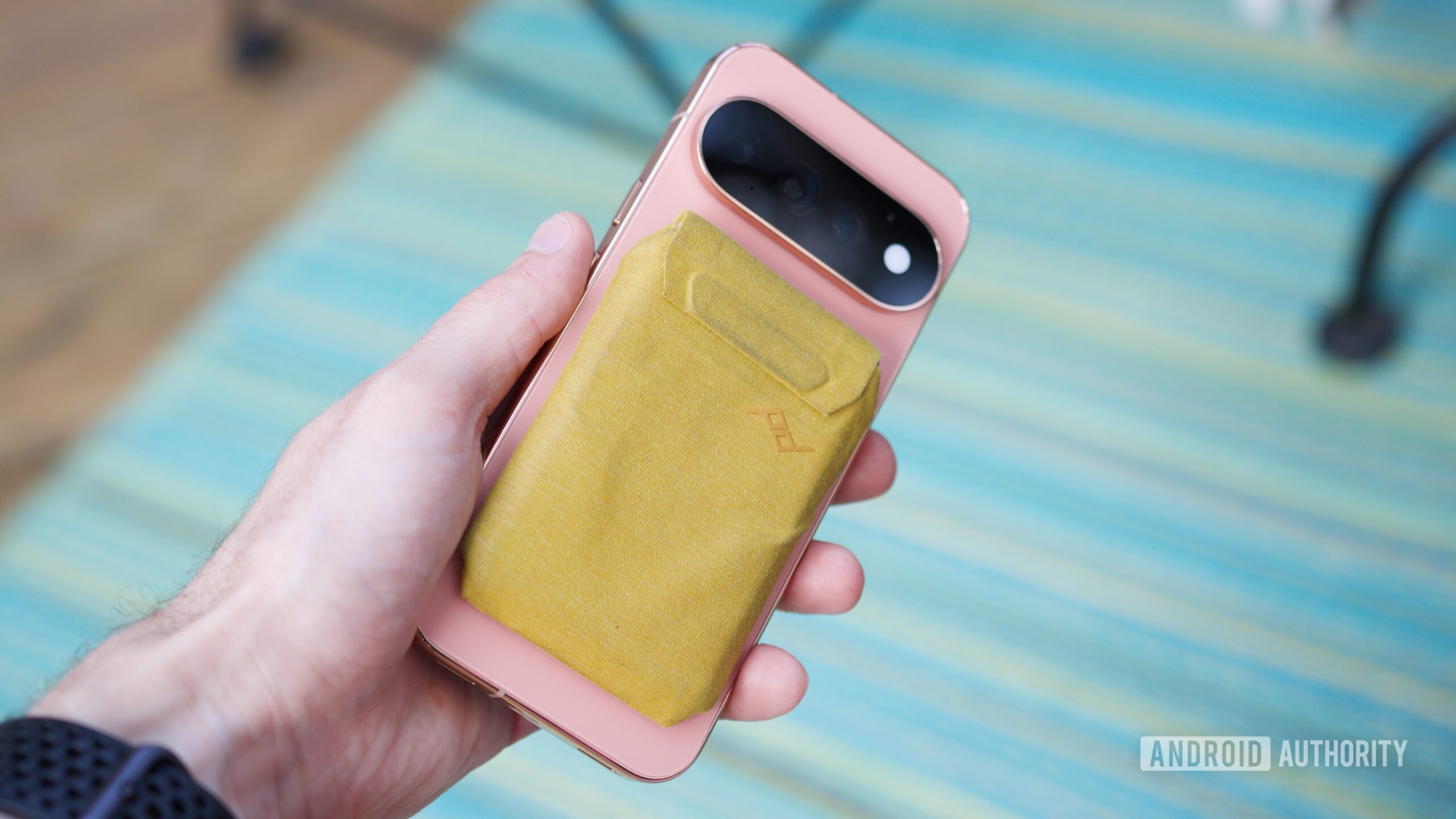 Pixel 11 Pro with a magnetic wallet on the back.