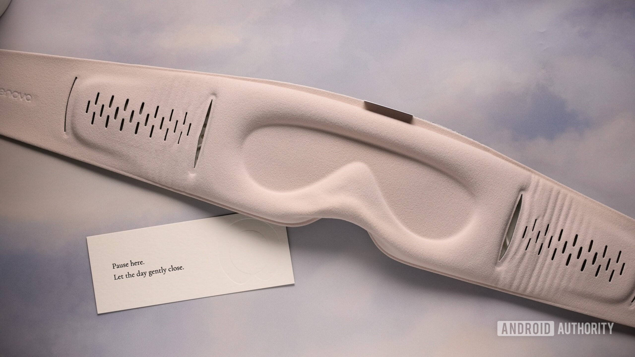 Interior view of the Sleenova sleep mask showing its contoured eye cups and adjustable speaker openings.
