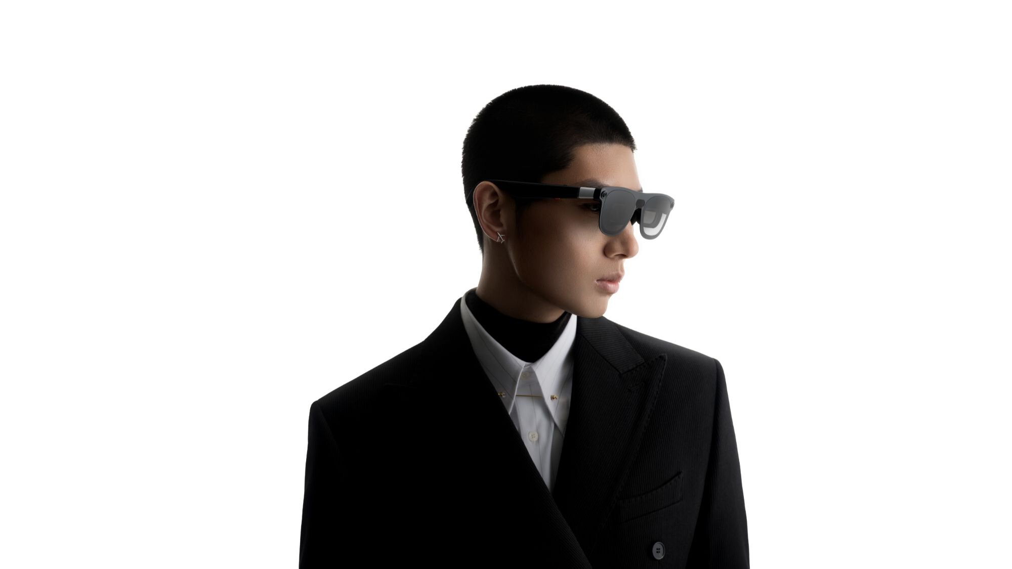 A person wearing the XREAL Aura Android XR smart glasses A person wearing the XREAL Aura Android XR smart glasses
