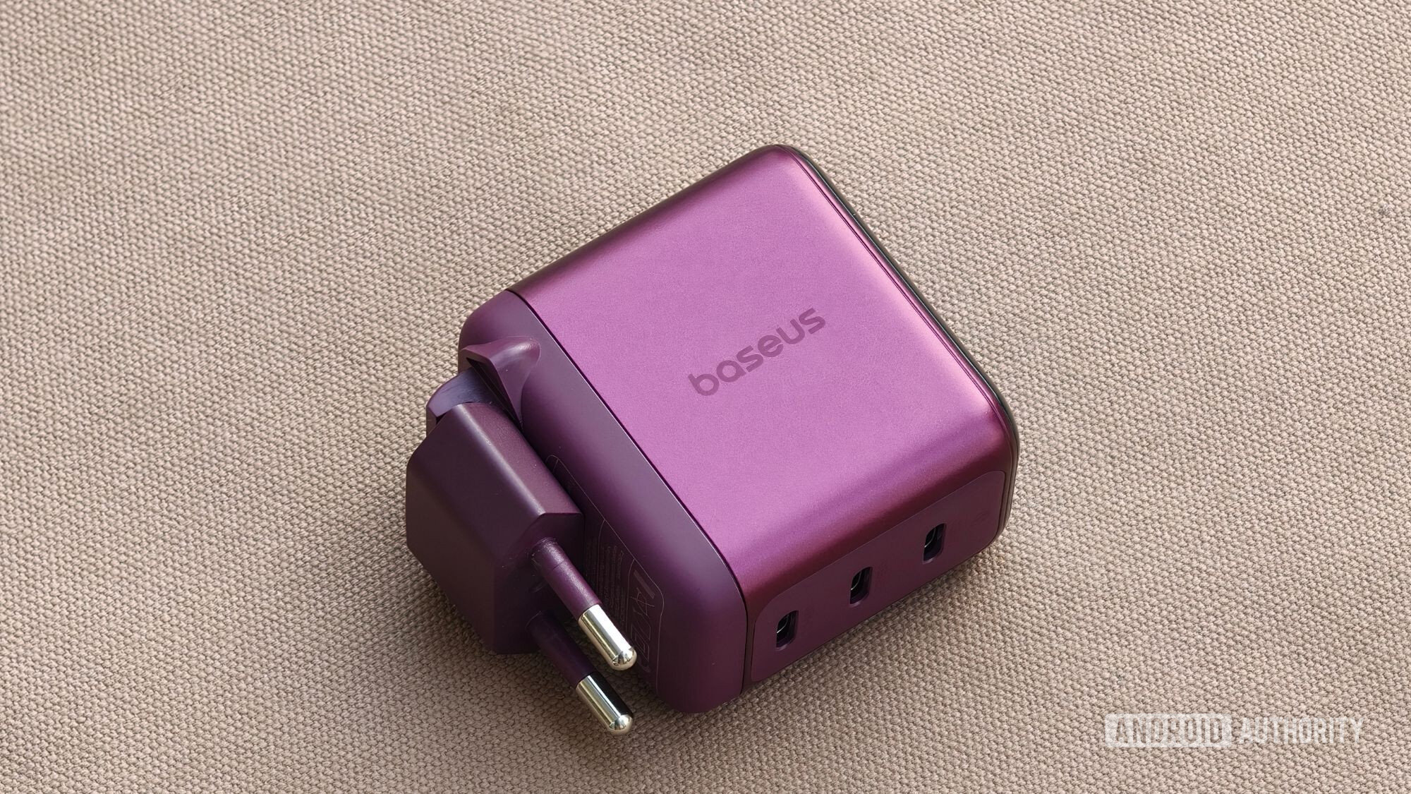 Baseus PicoGo Pro 100W GaN charger folded and kept on a table Baseus PicoGo Pro 100W GaN charger folded and kept on a table