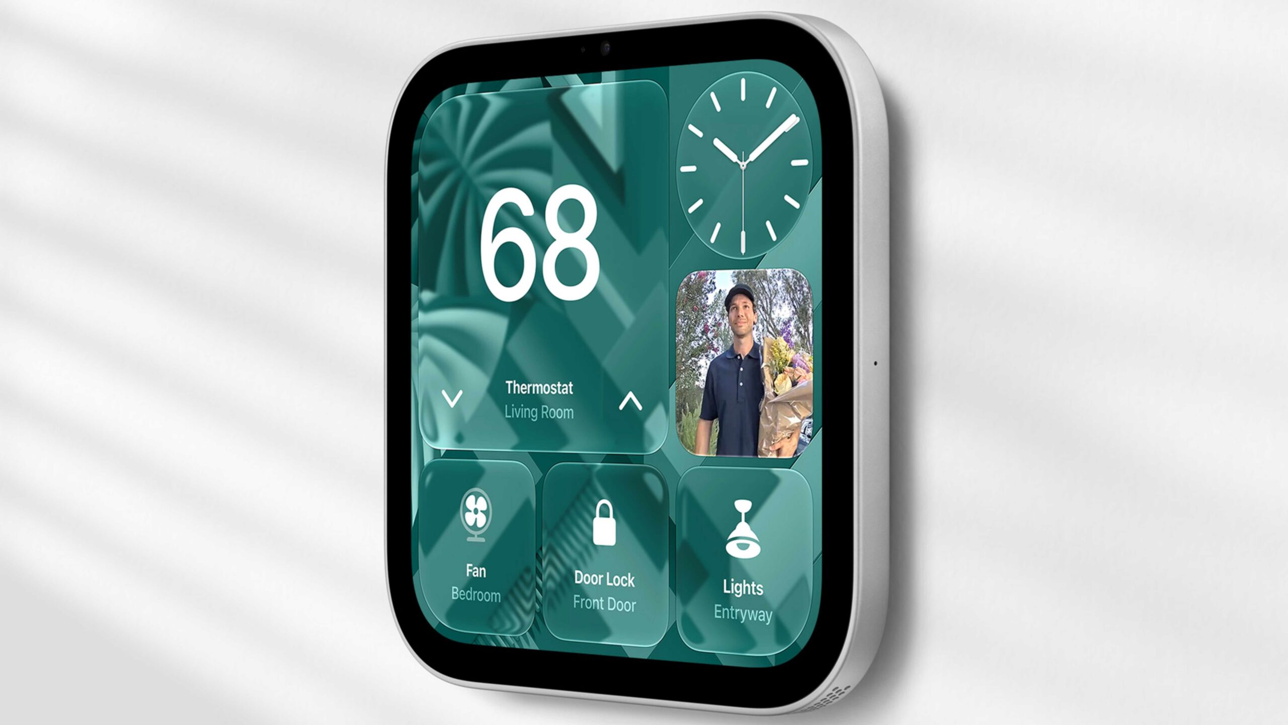 An Apple HomeView display mounted on a wall.