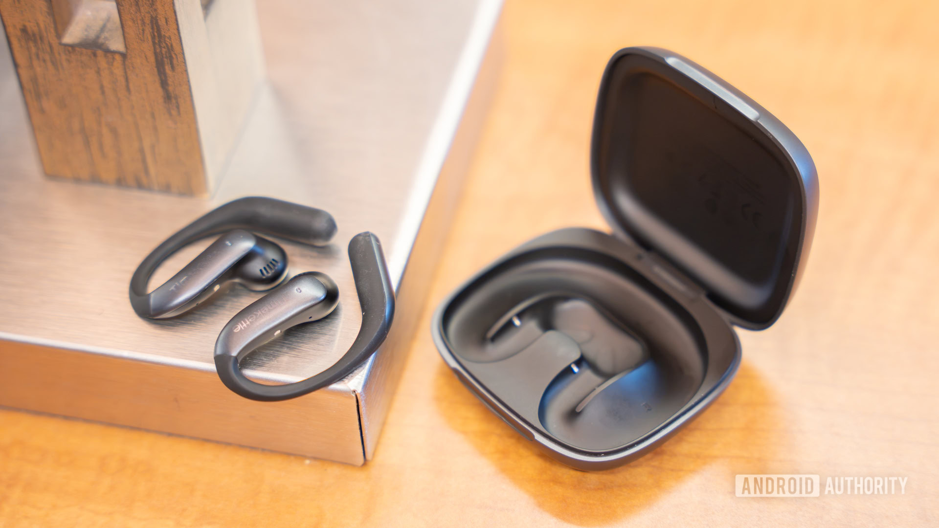 Timekettle LiveTalk AI Translation Earbuds case opened with earbuds outside 12