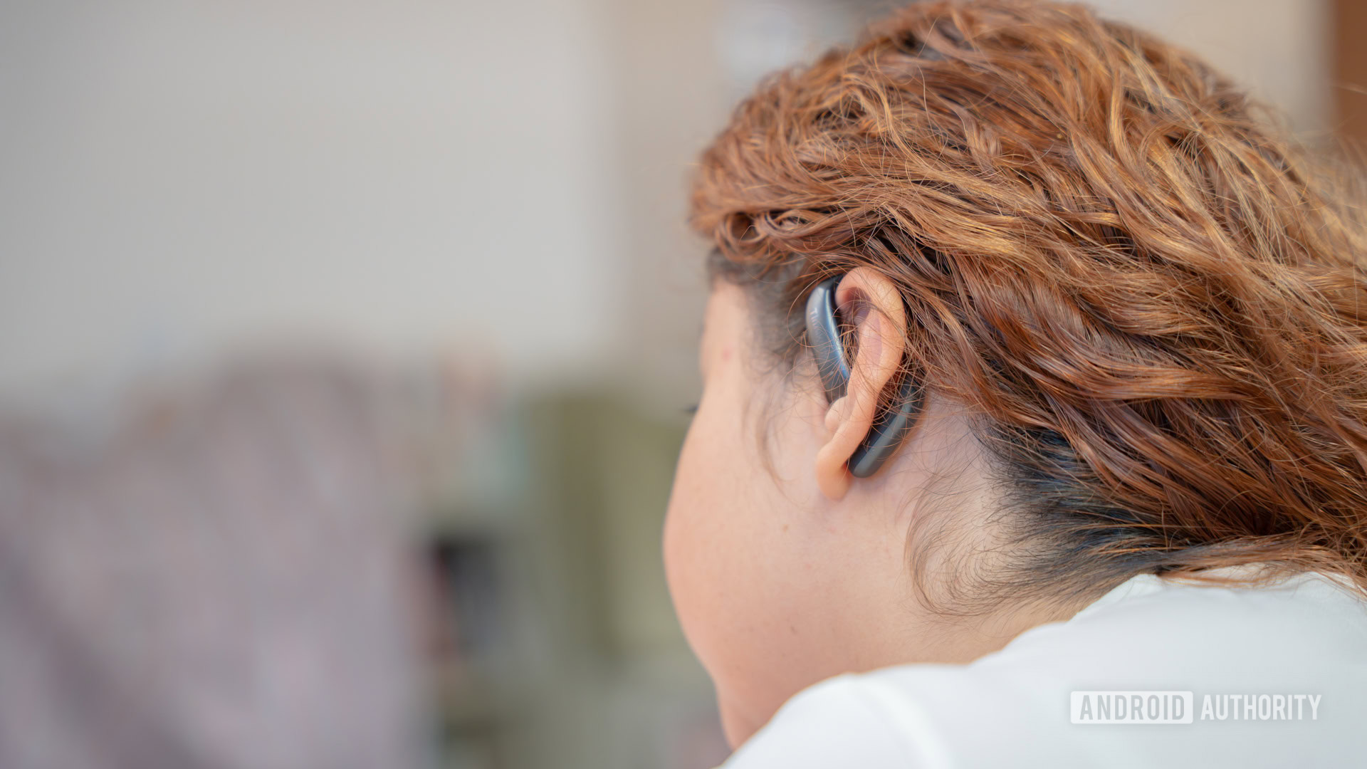 Woman using Timekettle LiveTalk 4