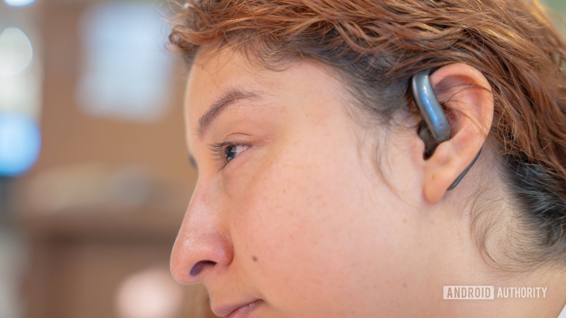 Woman using Timekettle LiveTalk 6