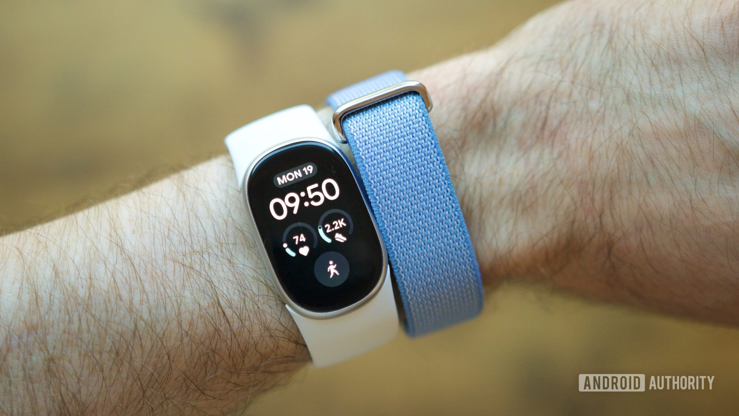 Photo of the Fitbit Edge next to the Fitbit Air.