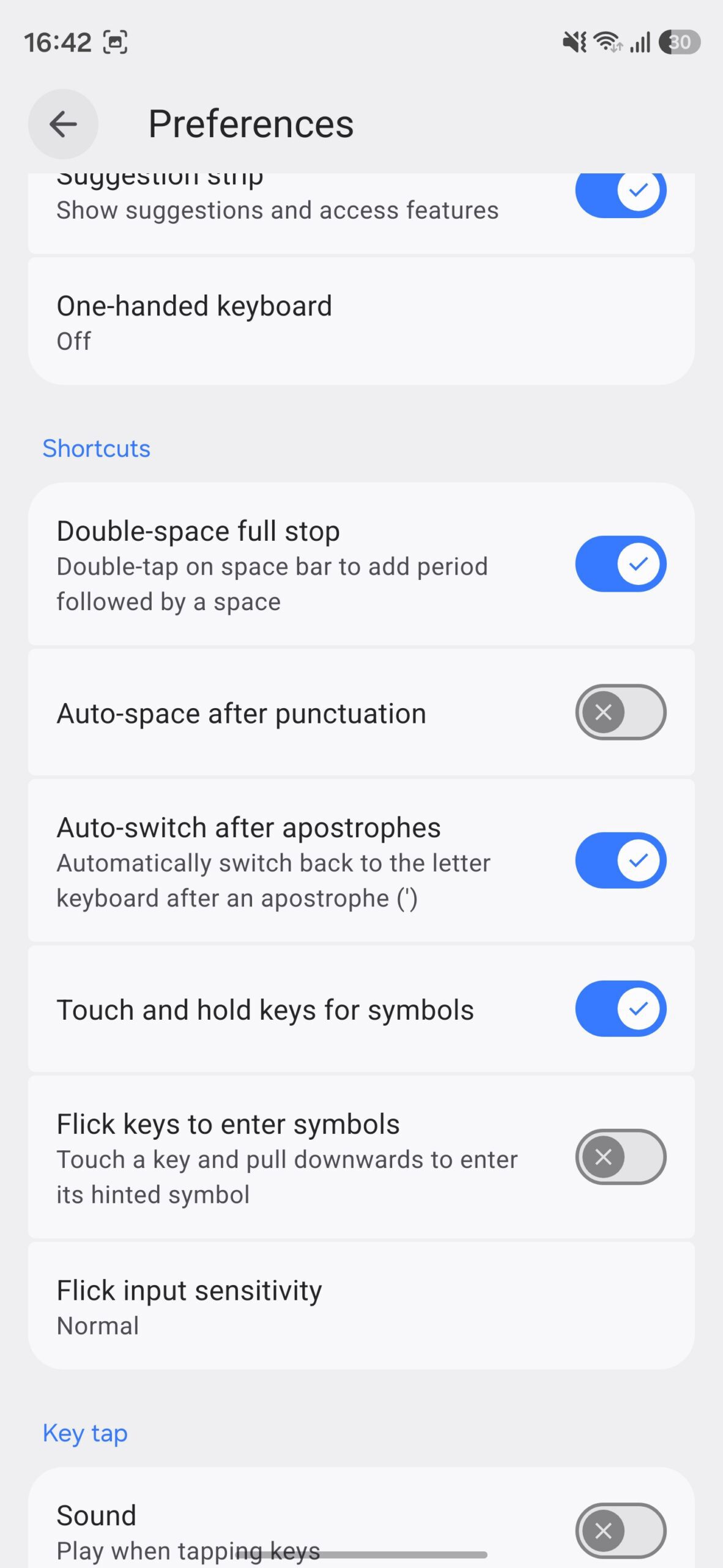 Gboard preferences page with Touch and hold keys for symbols turned on.