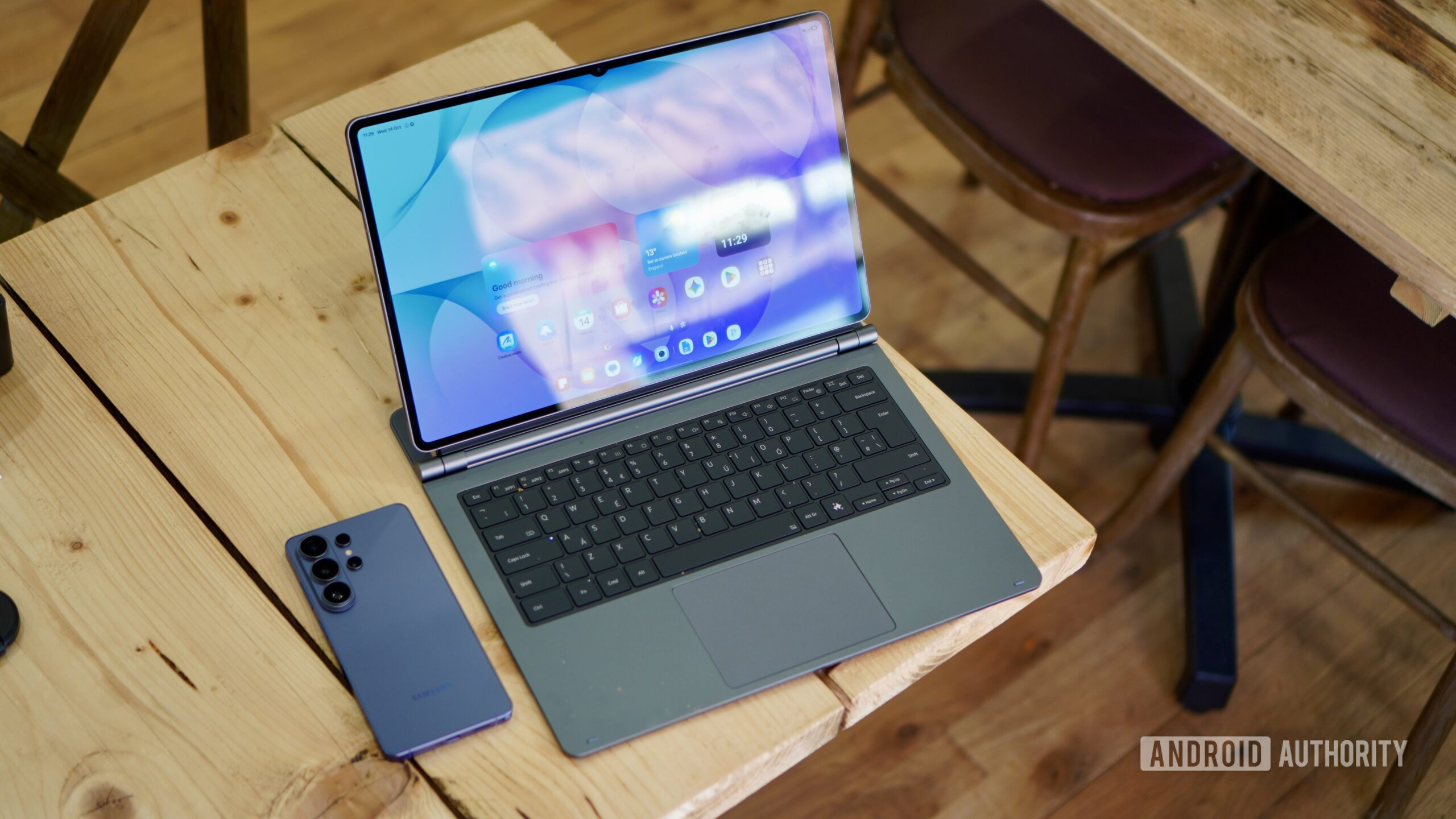 The Samsung Galaxy Tab S12 Ultra on a table with the Samsung Galaxy S26 Ultra