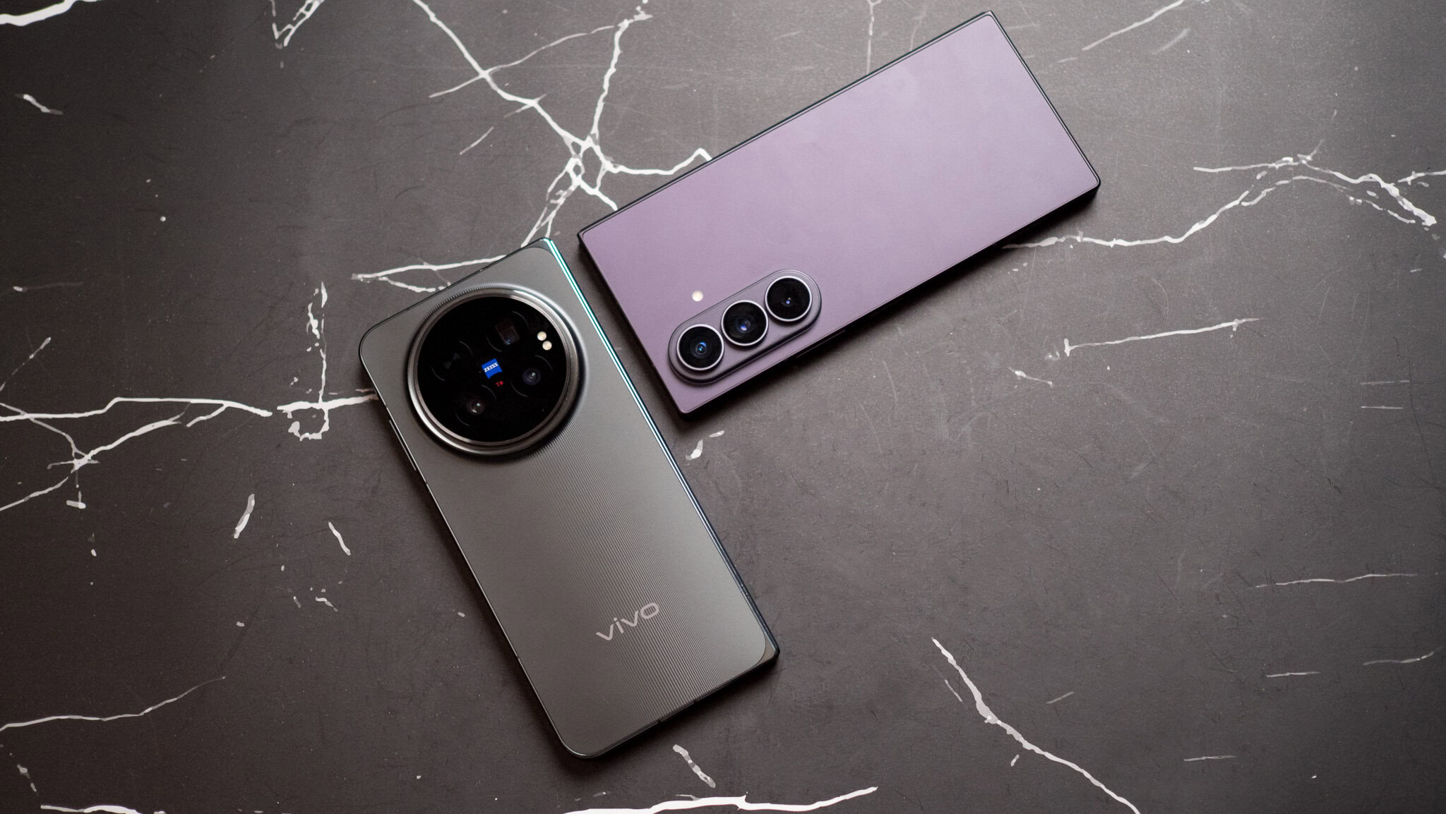 Vivo X Fold 6 on a table next to Galaxy Z Fold 8 Ultra