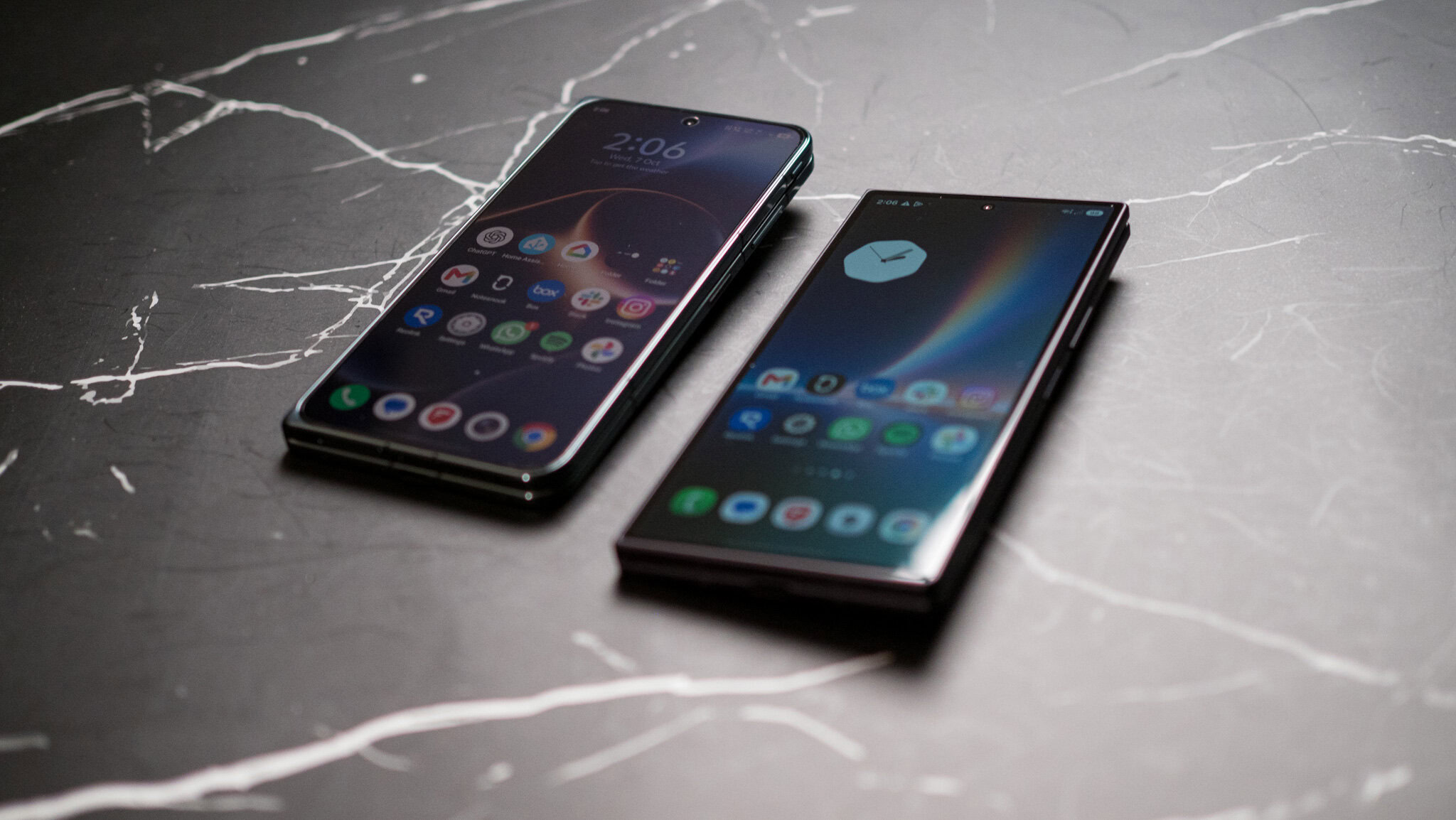 Vivo X Fold 6 on a table next to Galaxy Z Fold 8 Ultra